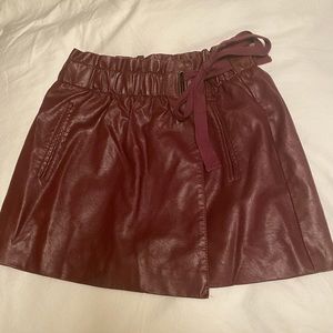 Burgundy faux leather mini skirt. Never worn!